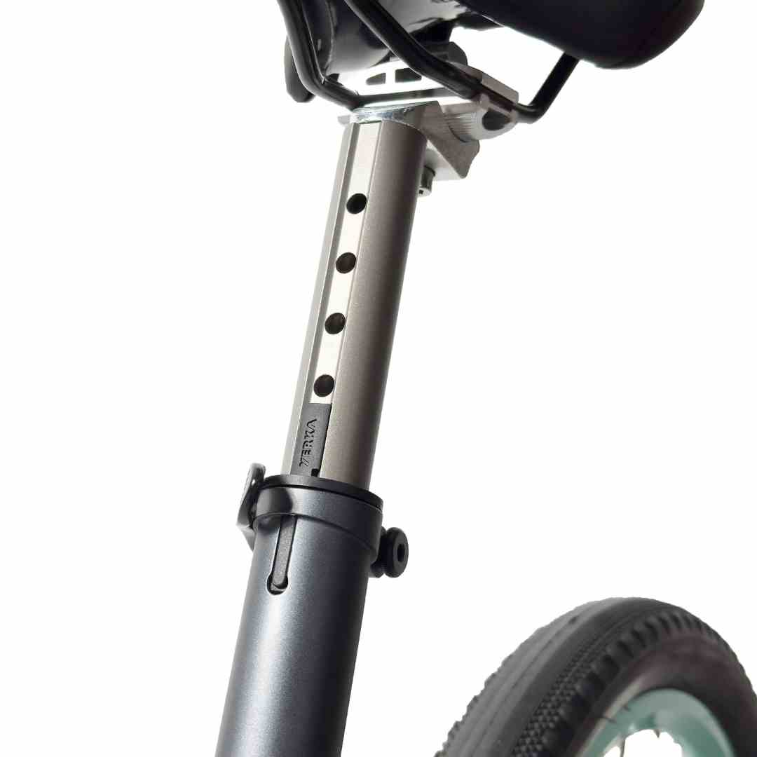 Close-up of adjustable bicycle seat post with height markings